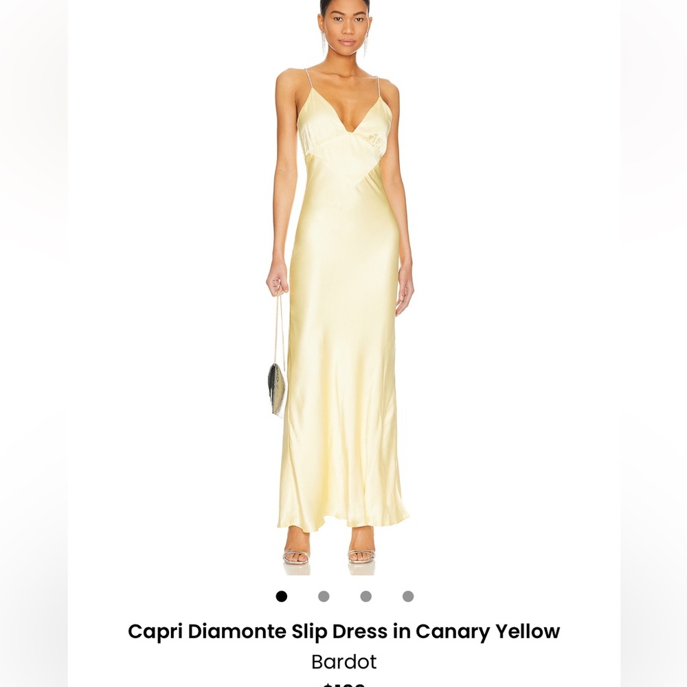 Yellow Slip dress from Bardot. Worn only once but has some black faded marks hem